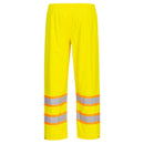Back view of yellow Class E rain pants with orange-bordered reflective bands on each leg