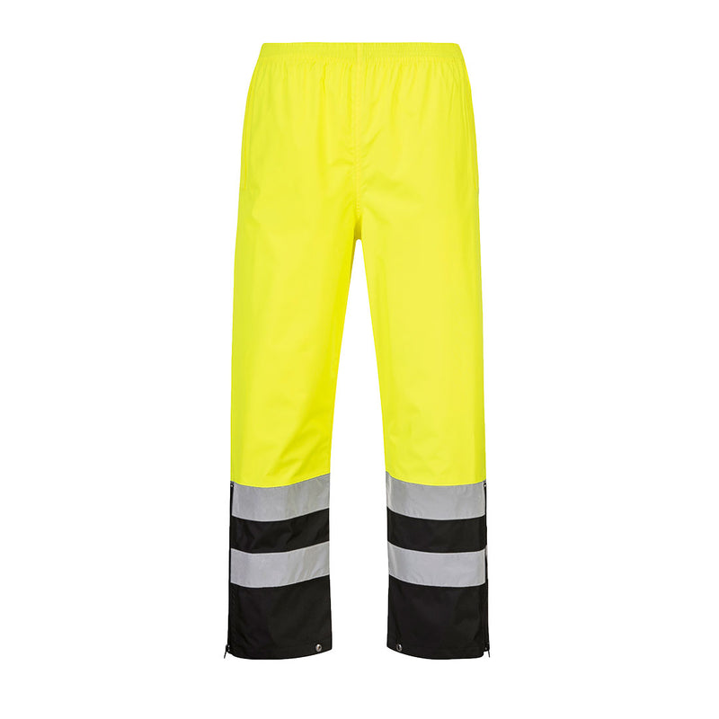 Front view of yellow and black Class E rain pants with reflective leg bands